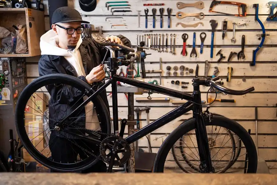 Man doing bike maintenance